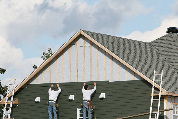 Professional Siding technician working in Osterburg, PA